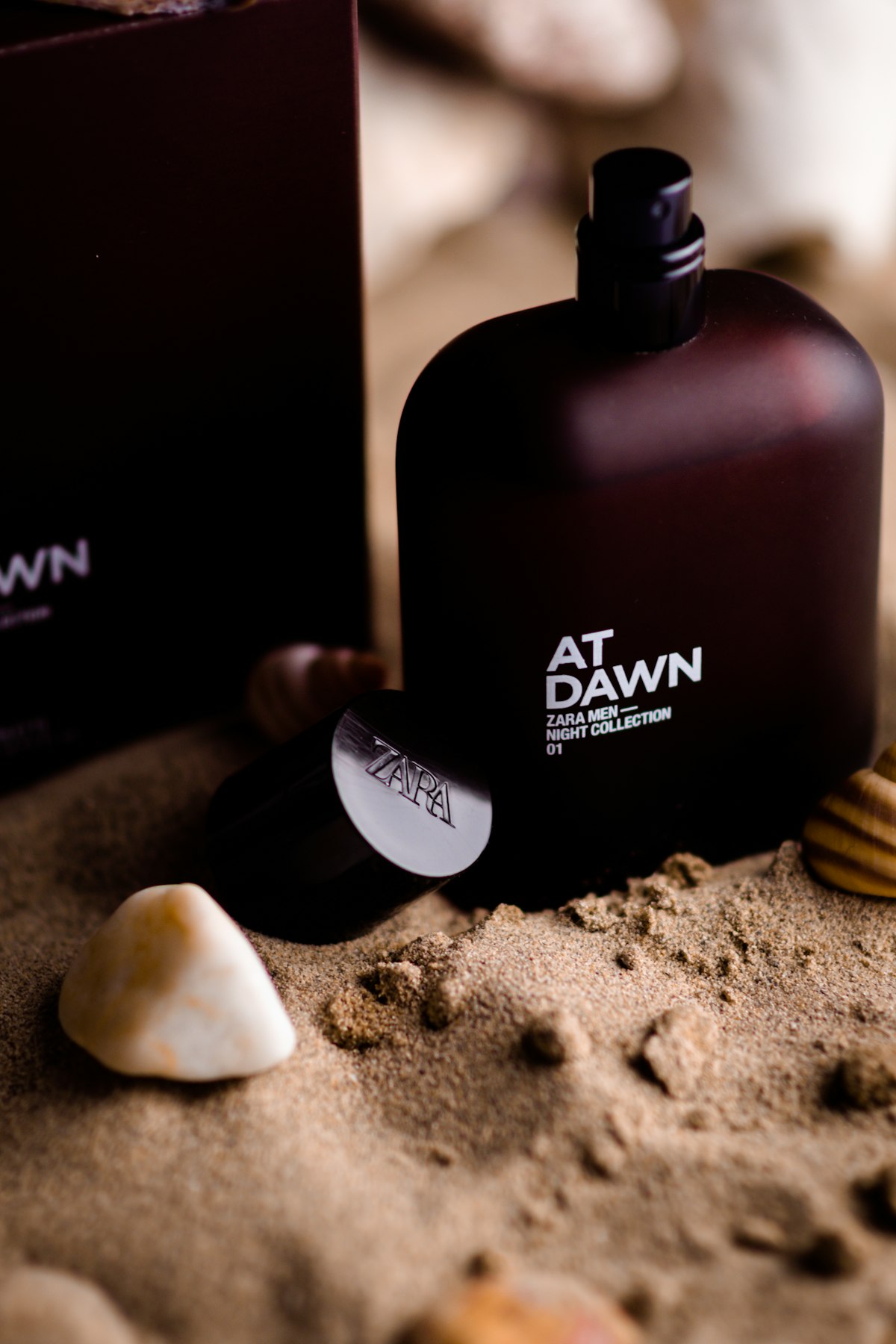 Dark oud perfume bottle product photo