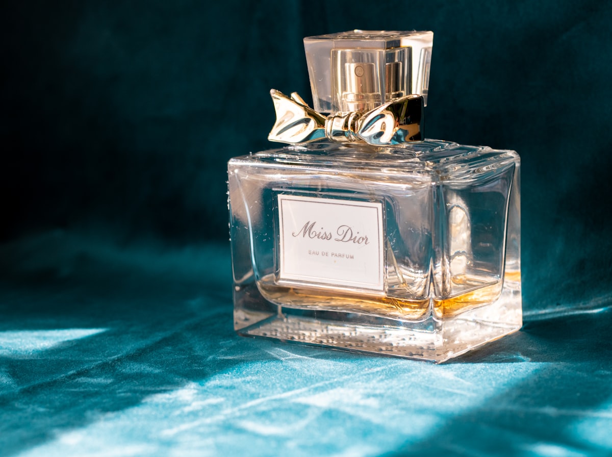 White floral perfume bottle product photo